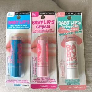 New 3 for $14 Maybelline baby lips/ Chapsticks. Clear, coral, and pink